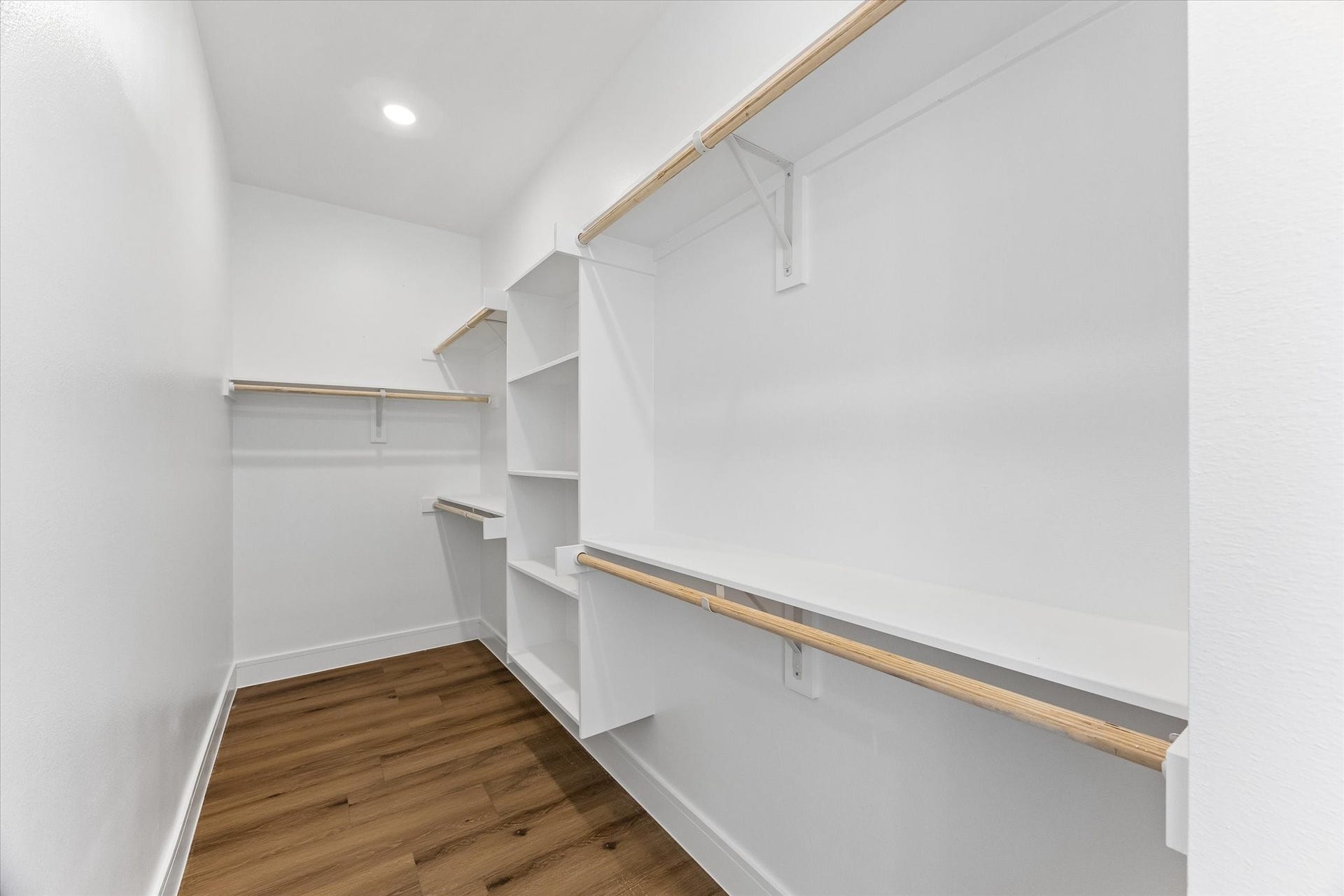 5106 Ricky Street, #A, Houston, TX 77033 Primary closet with built-in shelving and space for storage.