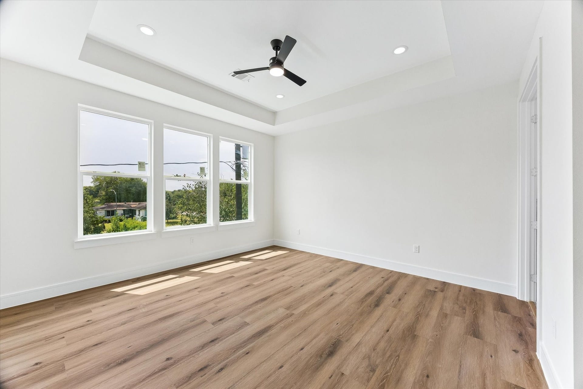 5106 Ricky Street, #A, Houston, TX 77033 Primary bedroom with laminate flooring.