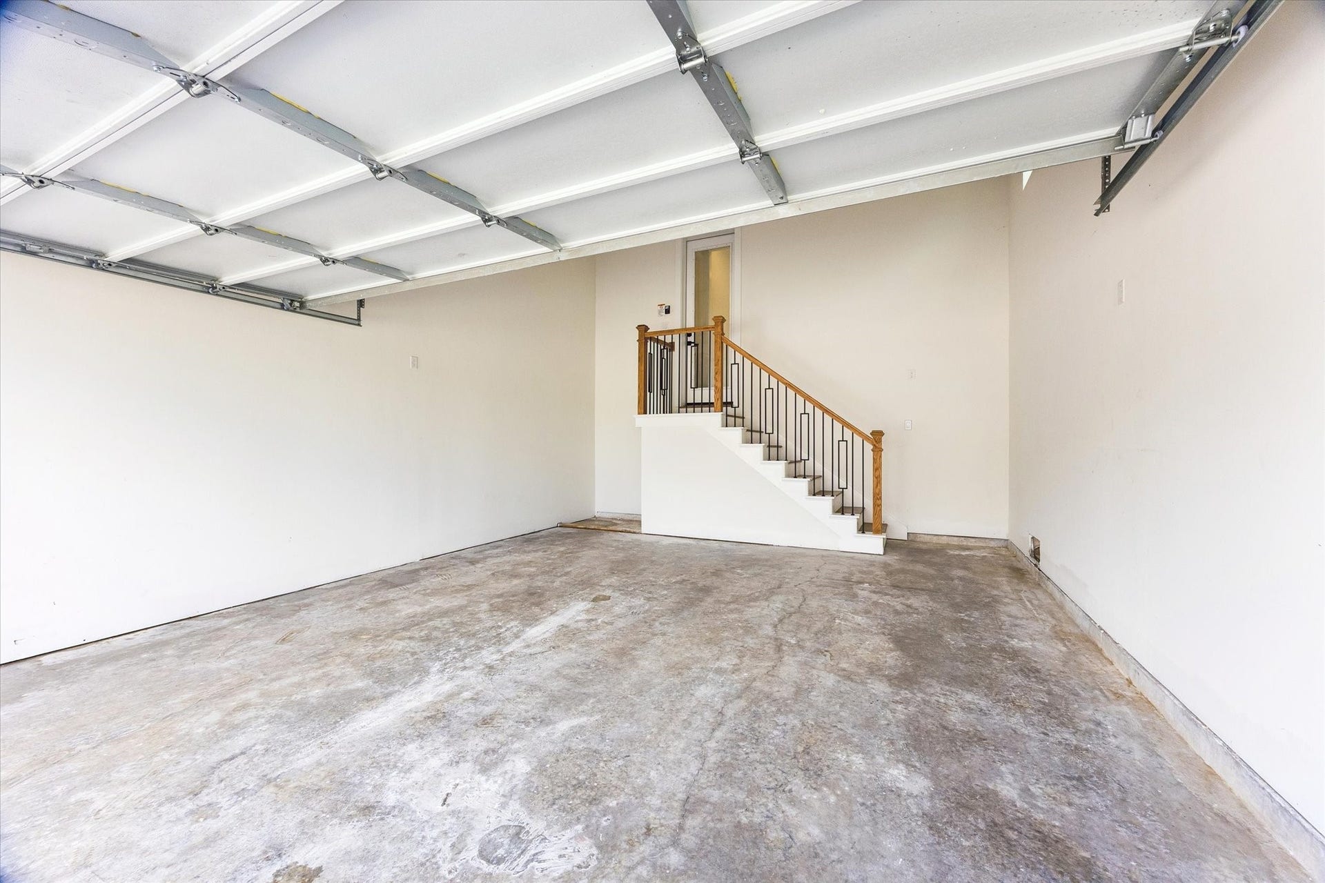 5106 Ricky Street, #A, Houston, TX 77033 Double car garage with high ceilings to offer additional storage units.