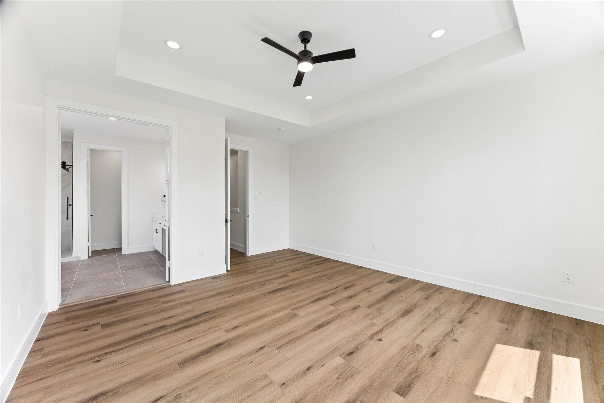 5106 Ricky Street, #A, Houston, TX 77033 Primary bedroom with room for a king bed and plenty of natural lighting.