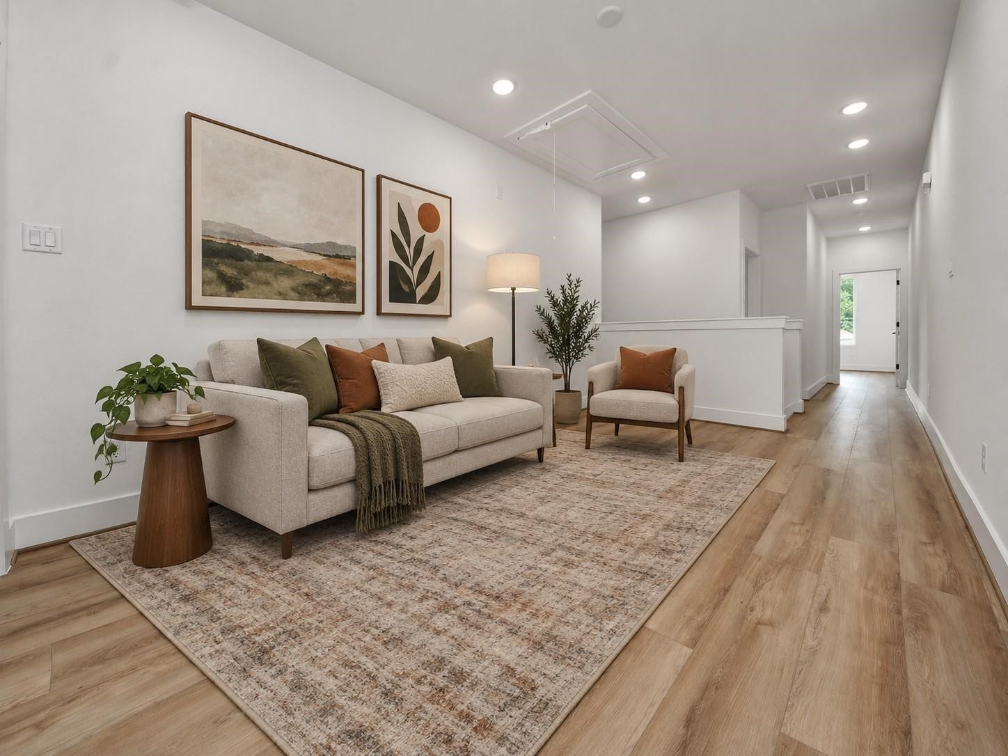 2606 Winbern Street, Houston, TX 77004 Virtually staged second-floor landing with a flexible sitting area and open access to the upstairs hallway.