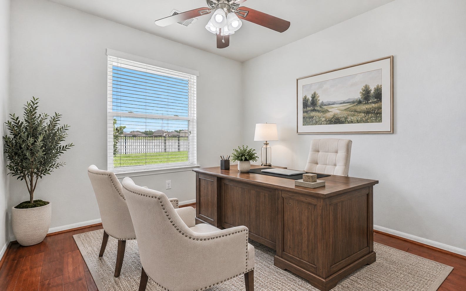 318 Lake Line Drive, Alvin, TX 77511 Tucked privately off the primary suite, this versatile study/flex room features wood flooring, fresh neutral paint, a ceiling fan & large window overlooking the backyard and pondideal for a home office, sitting room, nursery or exercise space. (virtually staged)