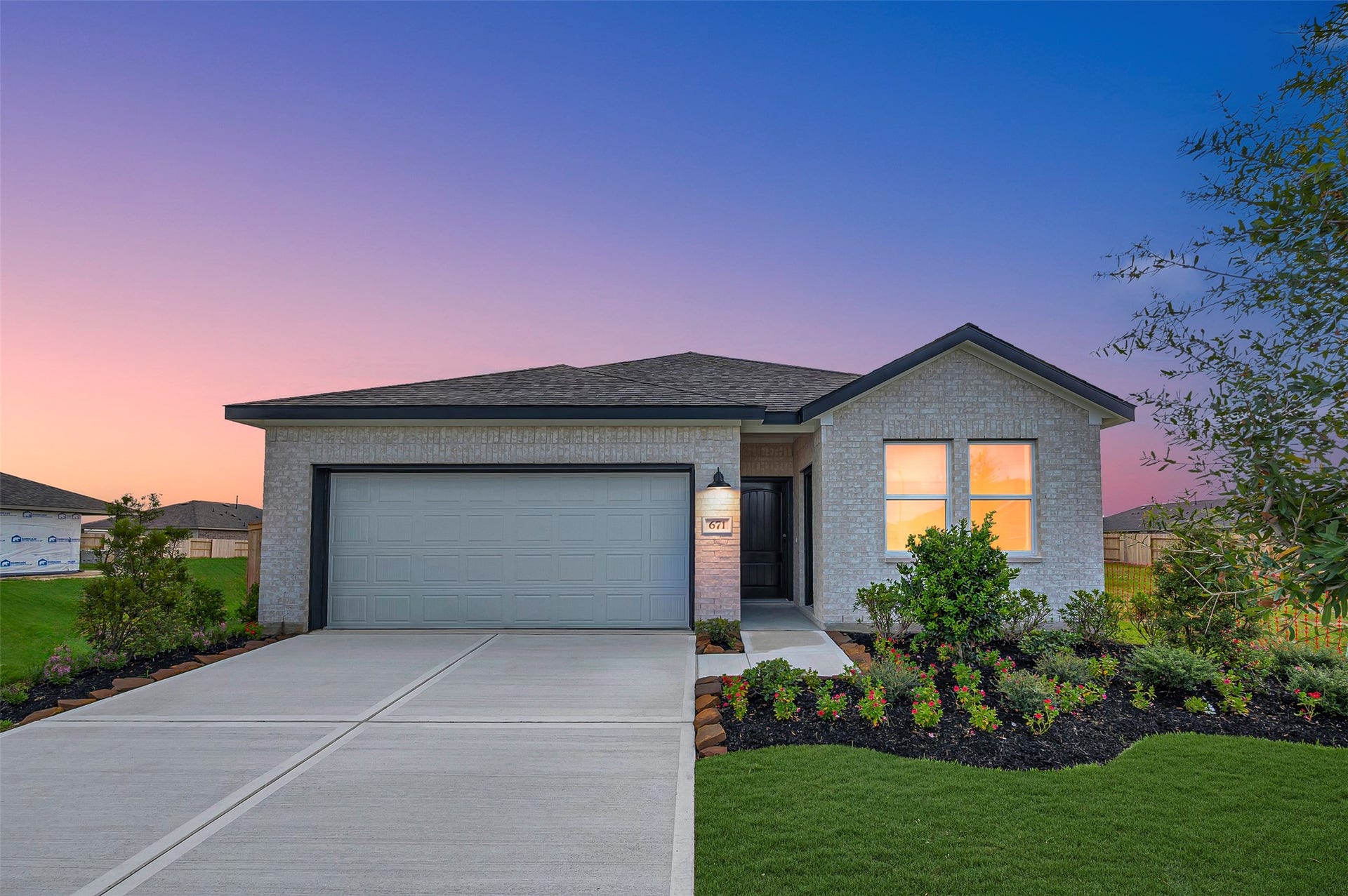 671 Daniel Lake Lane, Dayton, TX 77535 Lovely Orinoco II ESP design by K. Hovnanian Homes in elevation SA built in Aspire at River Ranch Trails.