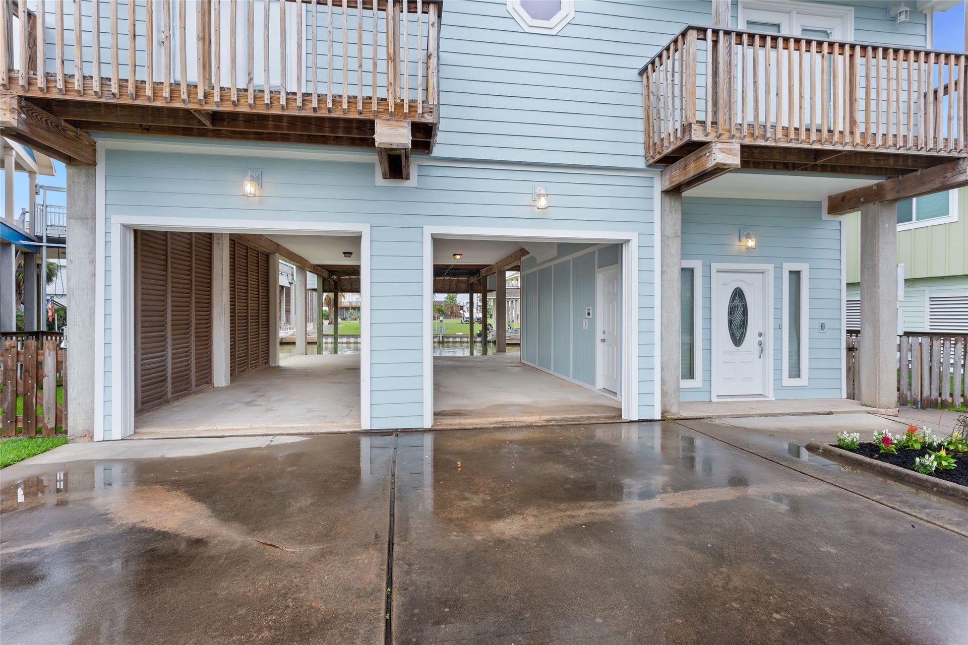 1110 Papeete Street, Tiki Island, TX 77554 2 car attached garage/carport