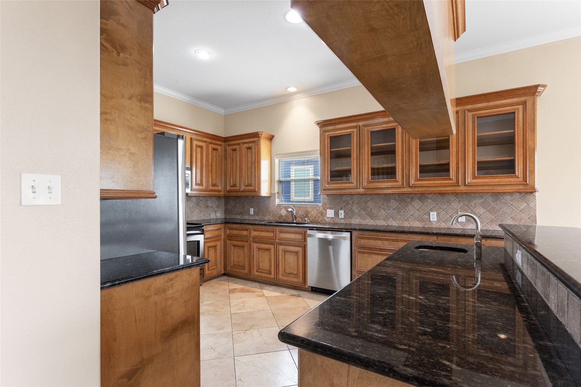 1110 Papeete Street, Tiki Island, TX 77554 Second floor kitchen with granite counter tops