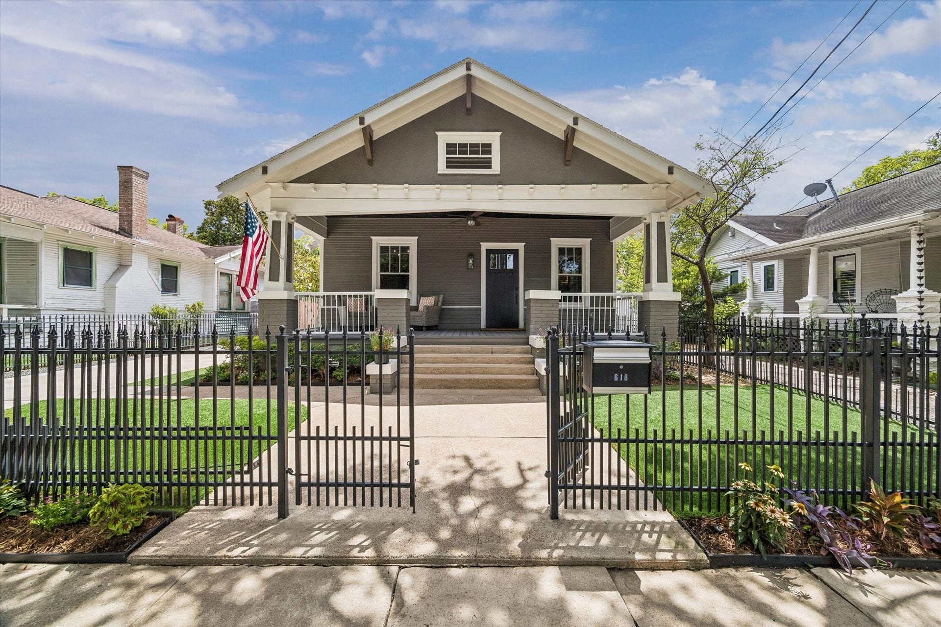 618 Bayland Avenue, Houston, TX 77009 Charming curb appeal with a low-maintenance lawn.