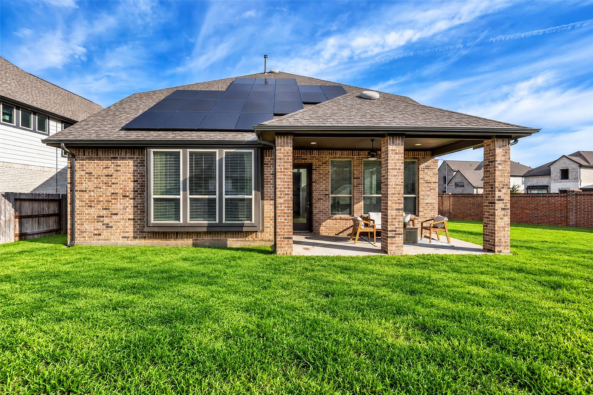 801 Bahia Bay Drive, Katy, TX 77493 This covered back patio overlooks a spacious backyard with ample room for a large pool, play equipment, and much more.