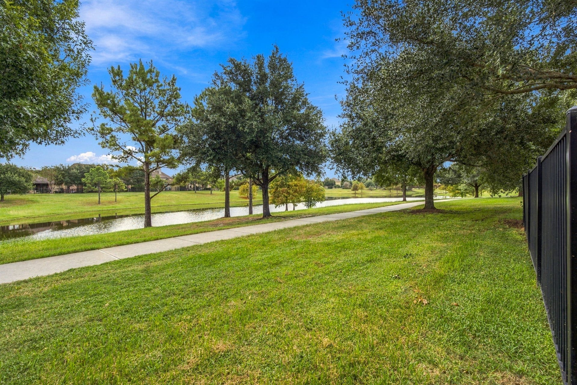 19215 Shady Blossom Drive, Cypress, TX 77433 Closer look at the peaceful waterfront scenery.