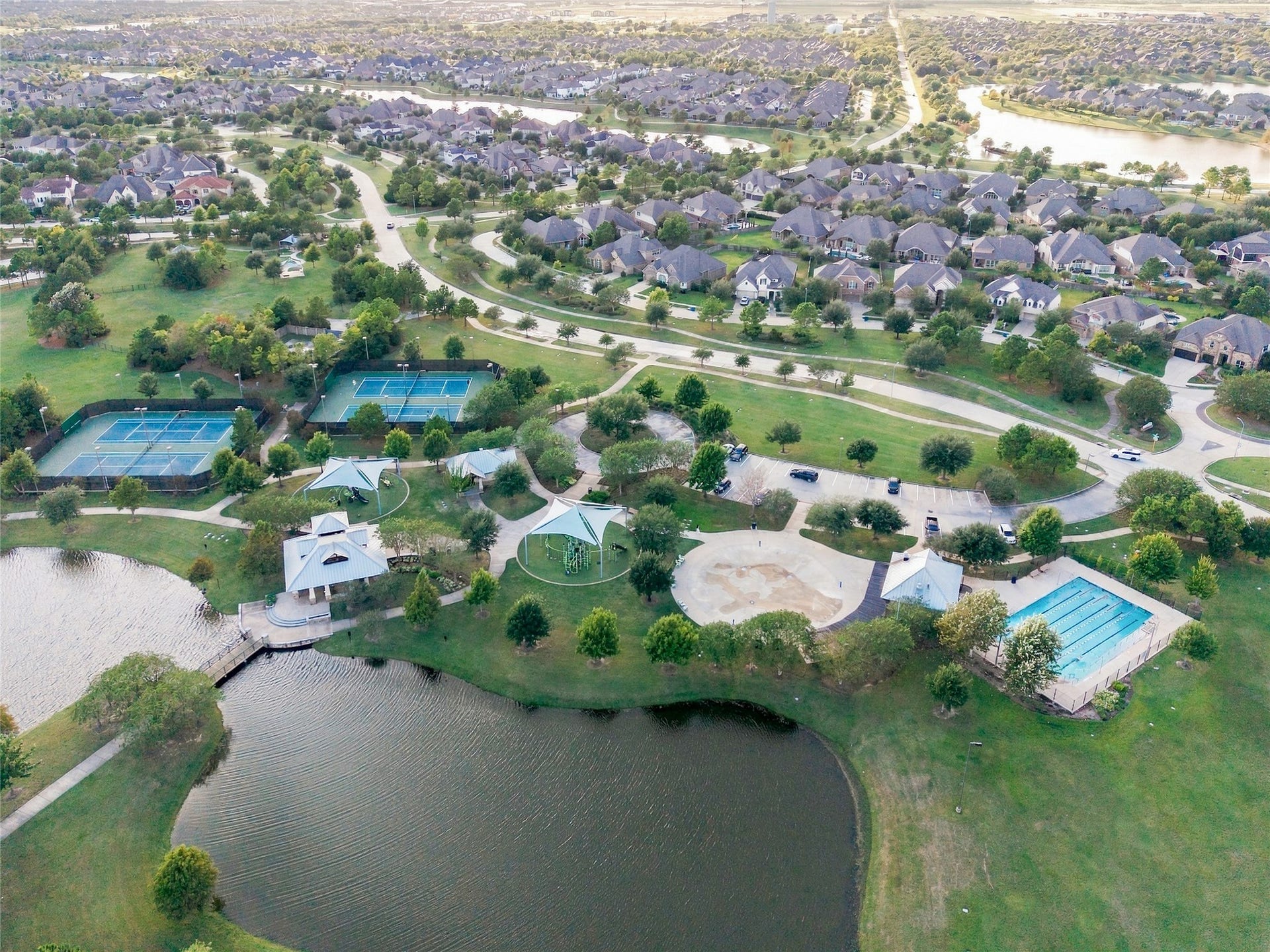 19215 Shady Blossom Drive, Cypress, TX 77433 Enjoy Bridgeland's incredible community amenities, including swimming pools, tennis courts, walking trails, and scenic lakes.