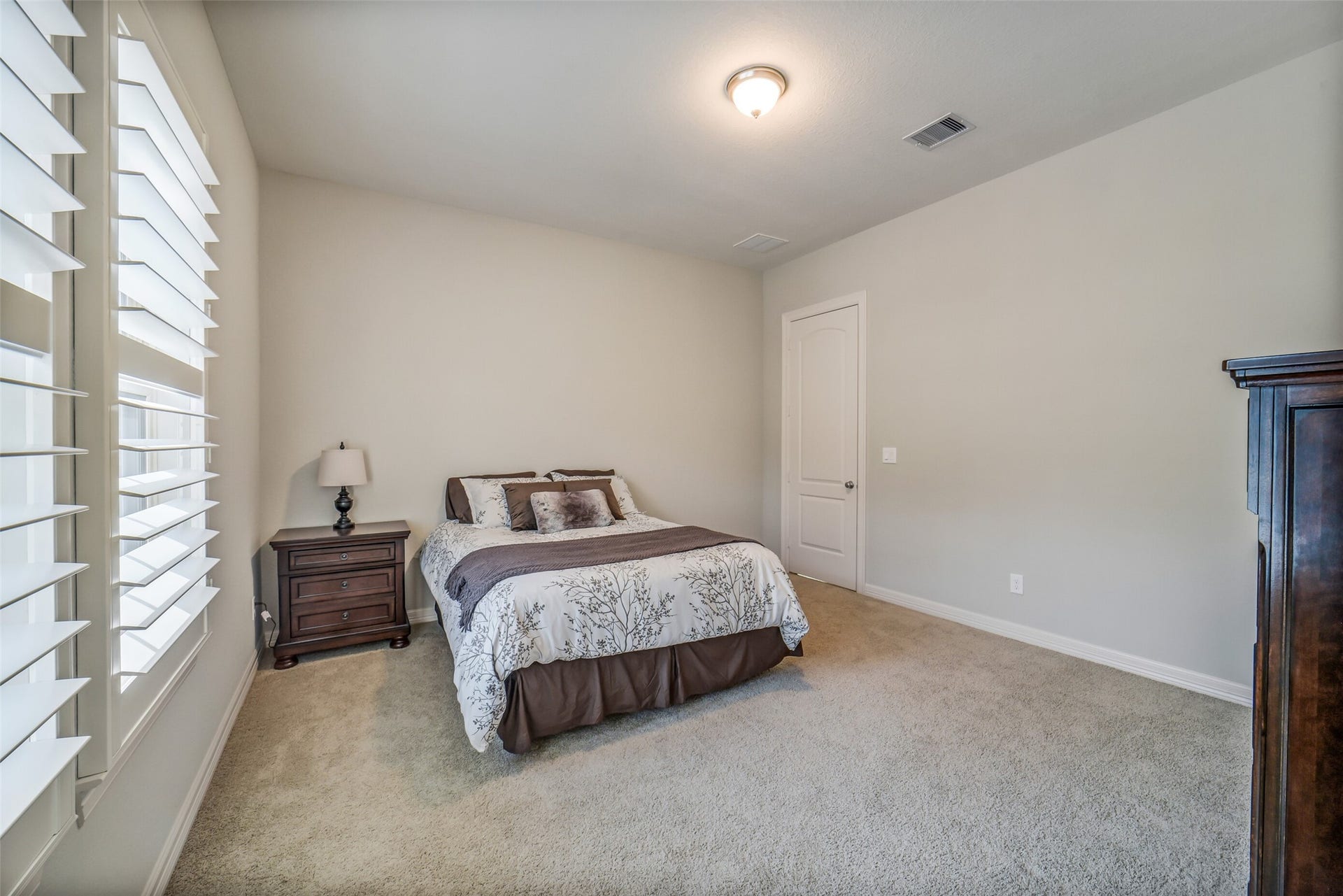 2721 Saddlehorn Trail, Katy, TX 77494 Notice plantation shutters throughout the home.