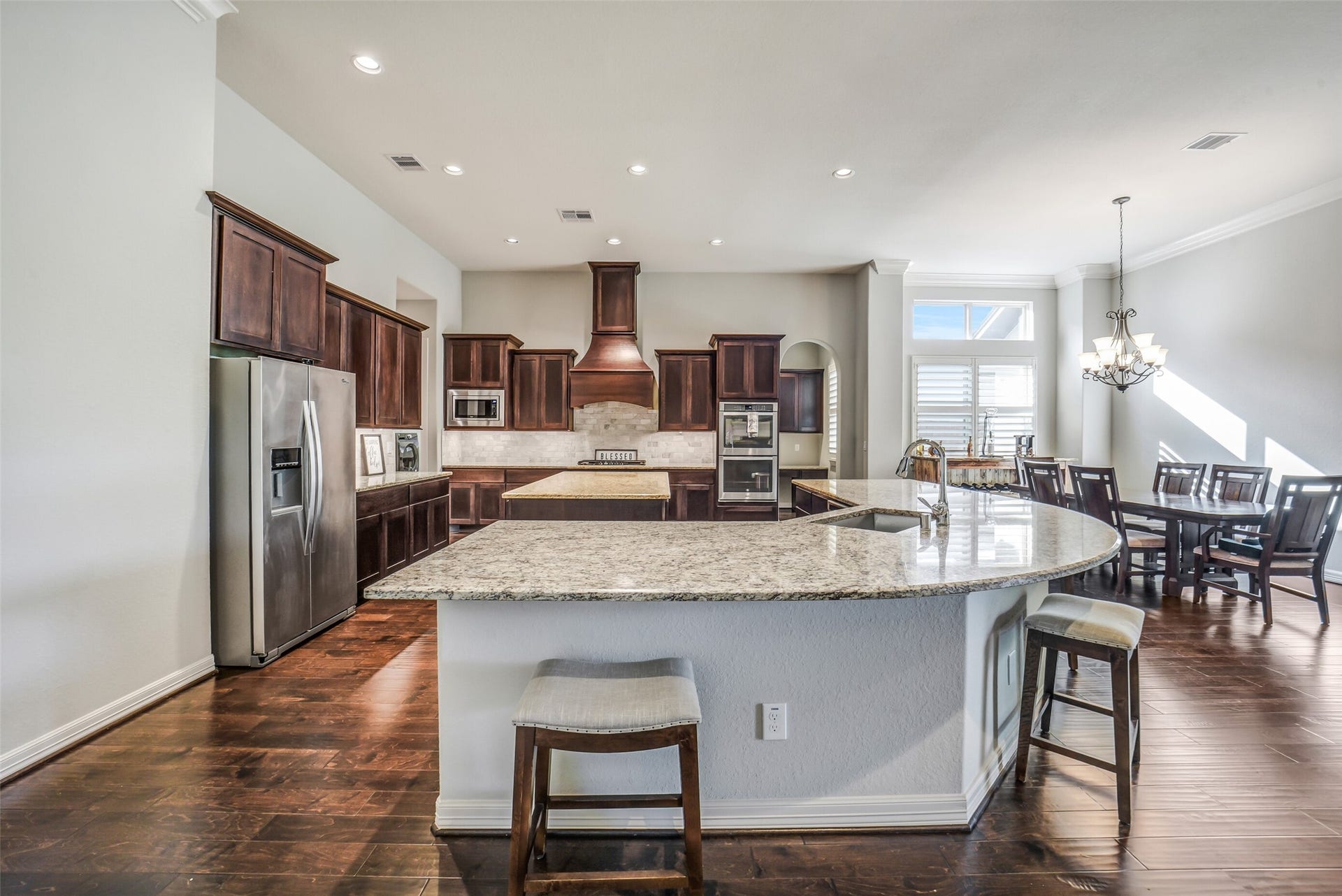2721 Saddlehorn Trail, Katy, TX 77494 Designed for those who love to cook and entertain, this stunning kitchen showcases TWO spacious islands, with an abundance of countertop space, custom cabinetry, stainless steel appliances, and a walk in pantry.