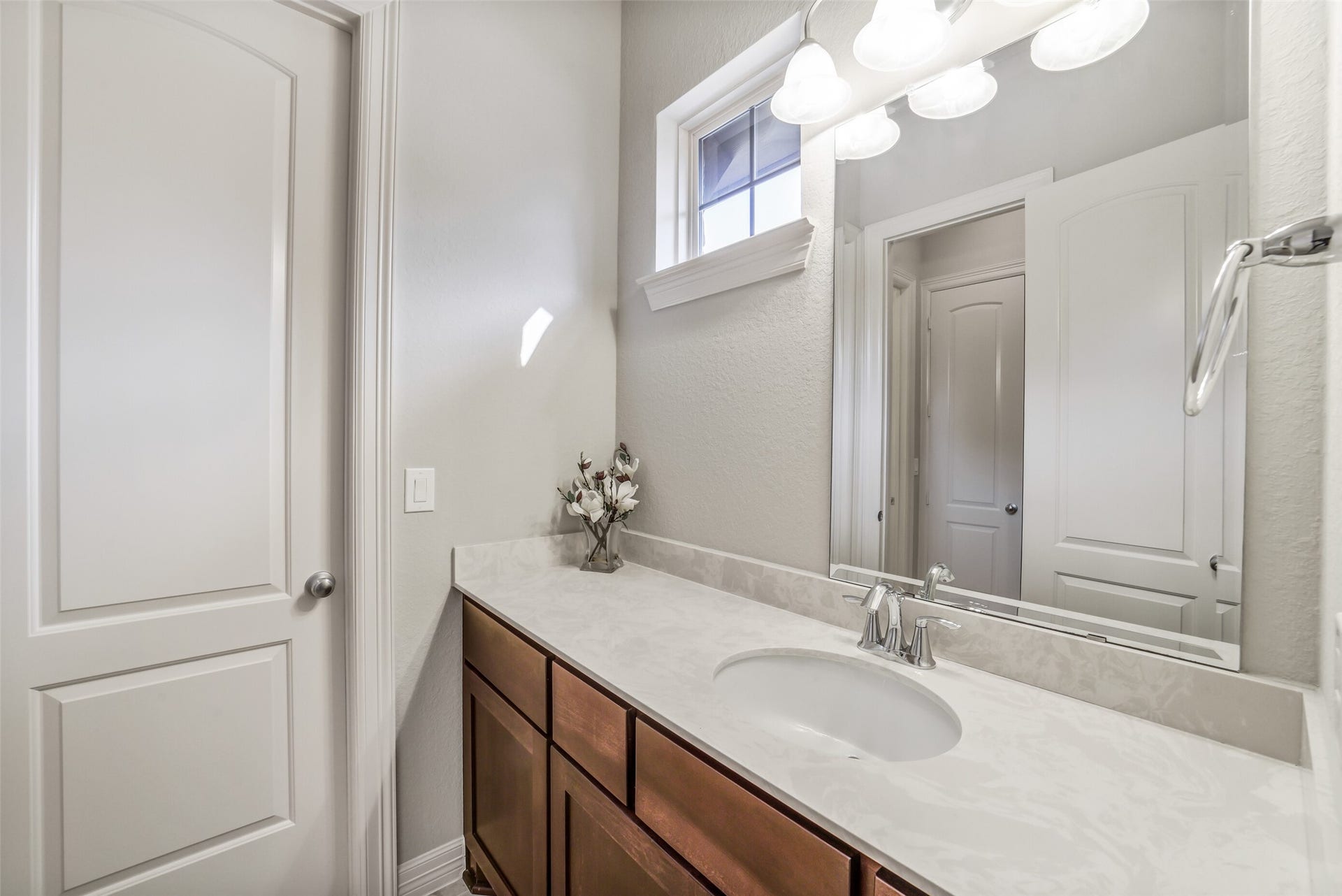 2721 Saddlehorn Trail, Katy, TX 77494 This jack-and-jill bathroom is thoughtfully designed with two separate vanities, each offering ample counter space and plenty of cabinet storage. Perfectly positioned between the bedrooms, it provides comfort, and privacy for everyone.
