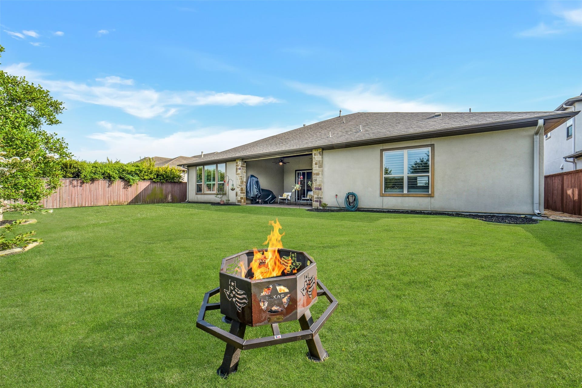 2721 Saddlehorn Trail, Katy, TX 77494 Step outside to your private backyard retreat featuring an oversized lawn, covered patio, and plenty of room for entertaining or future outdoor additions.