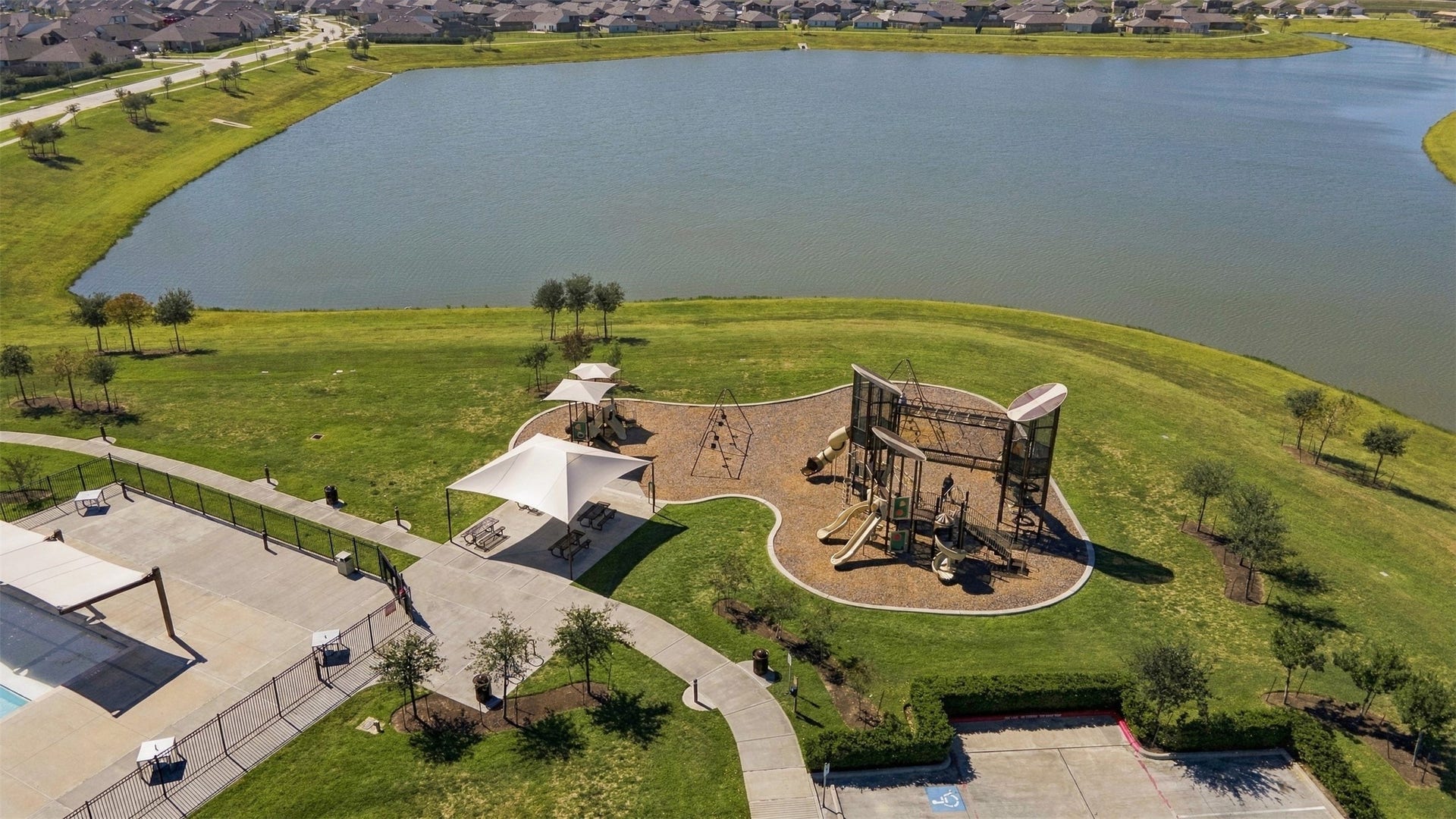 4511 Aspen Colony Lane, Baytown, TX 77521 Playground / Lake