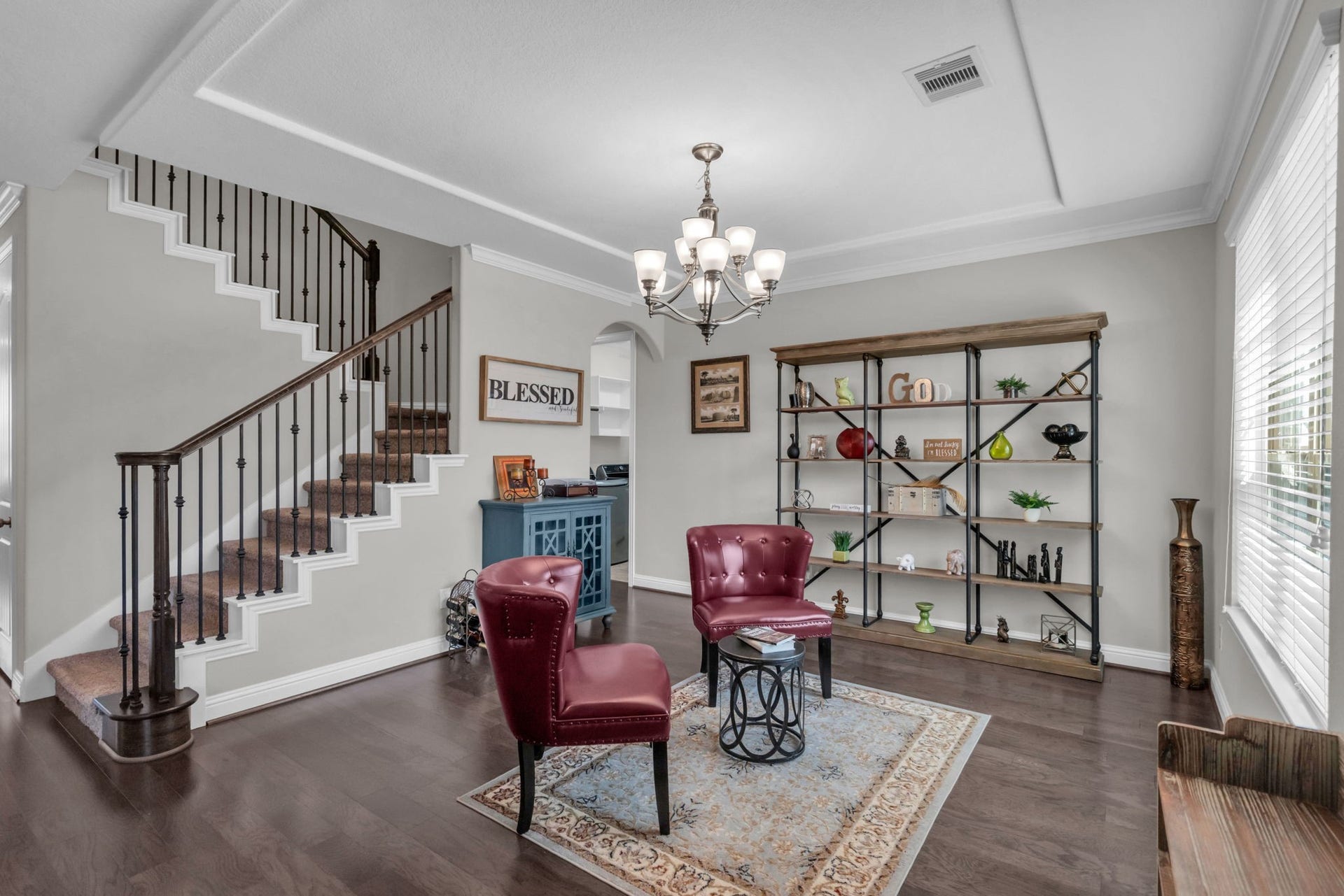Bright flex space just off the entry, perfect as a sitting room or dining room.