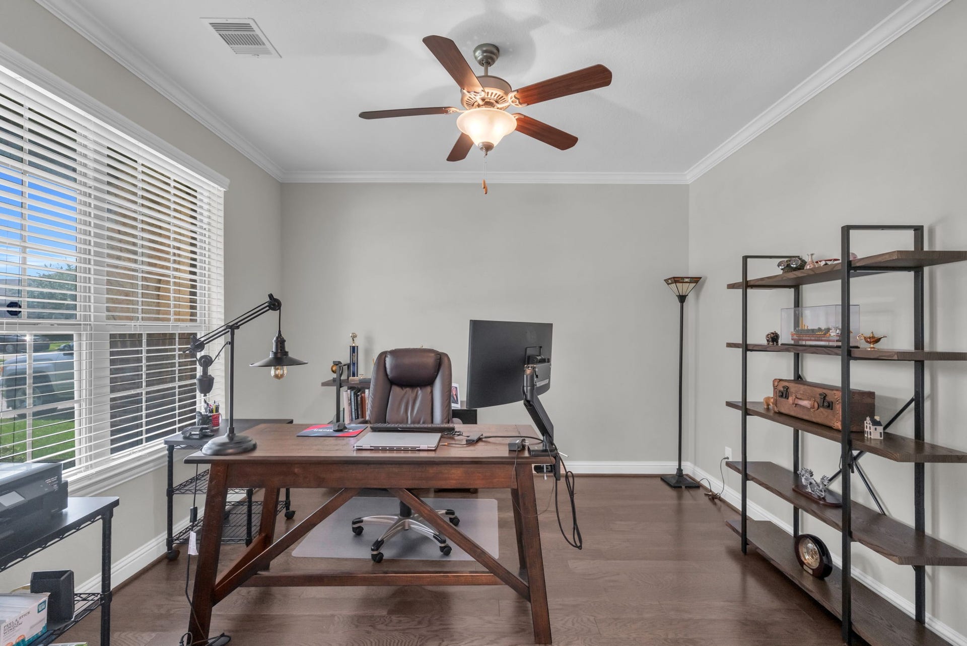 Private home office with front yard views.