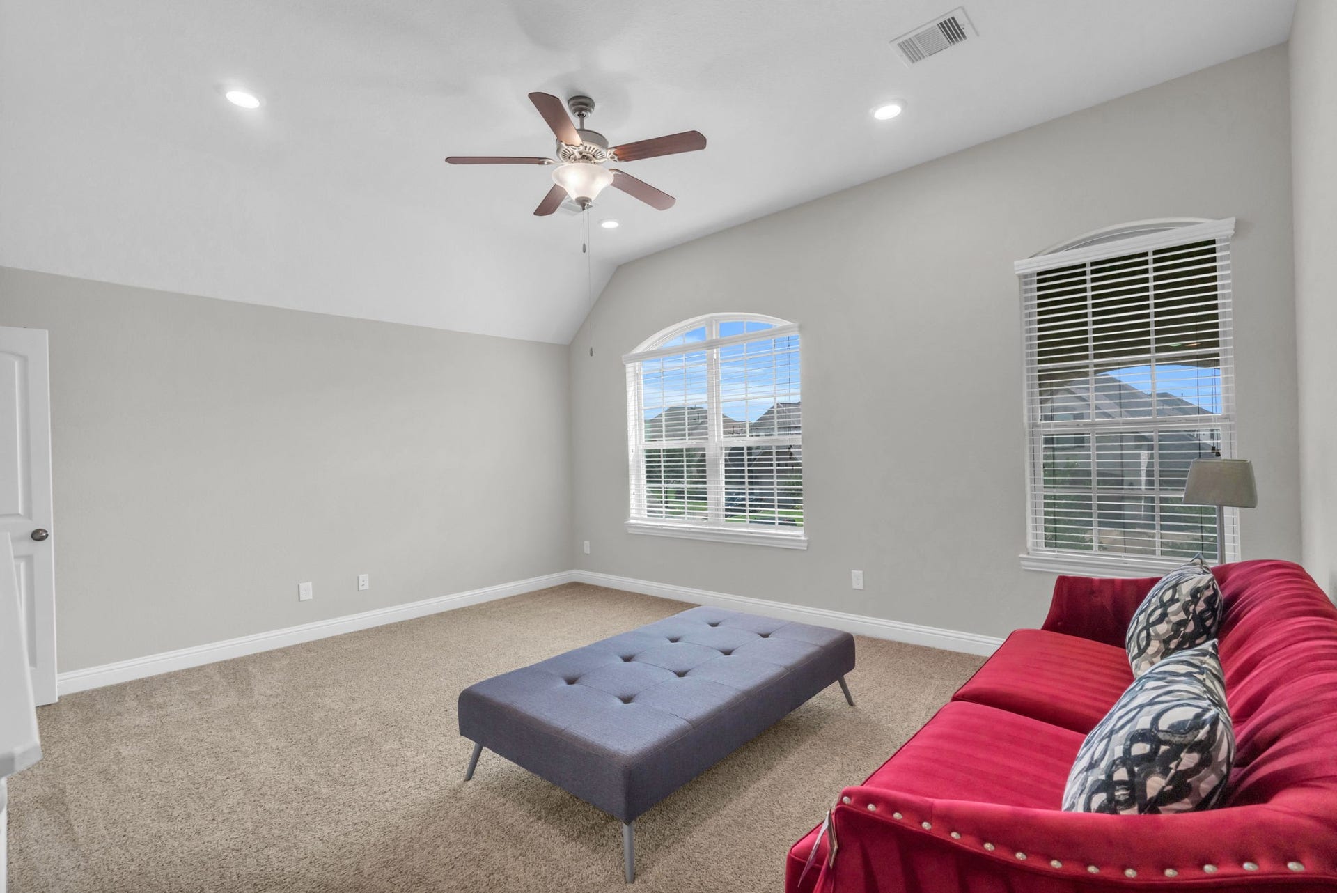 Upstairs flex room that is perfect for a game room or playroom.