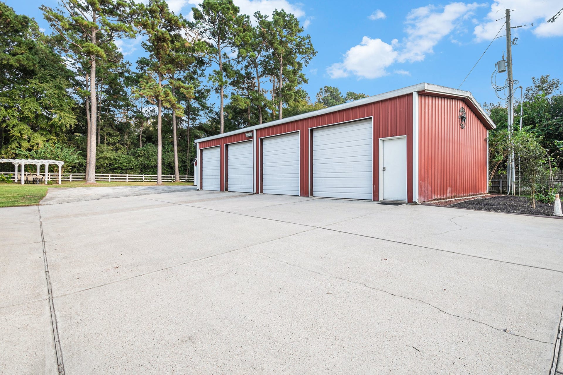 28126 Indigo Lake Court, Magnolia, TX 77355 View of the fantastic 4-car garage/workshop!