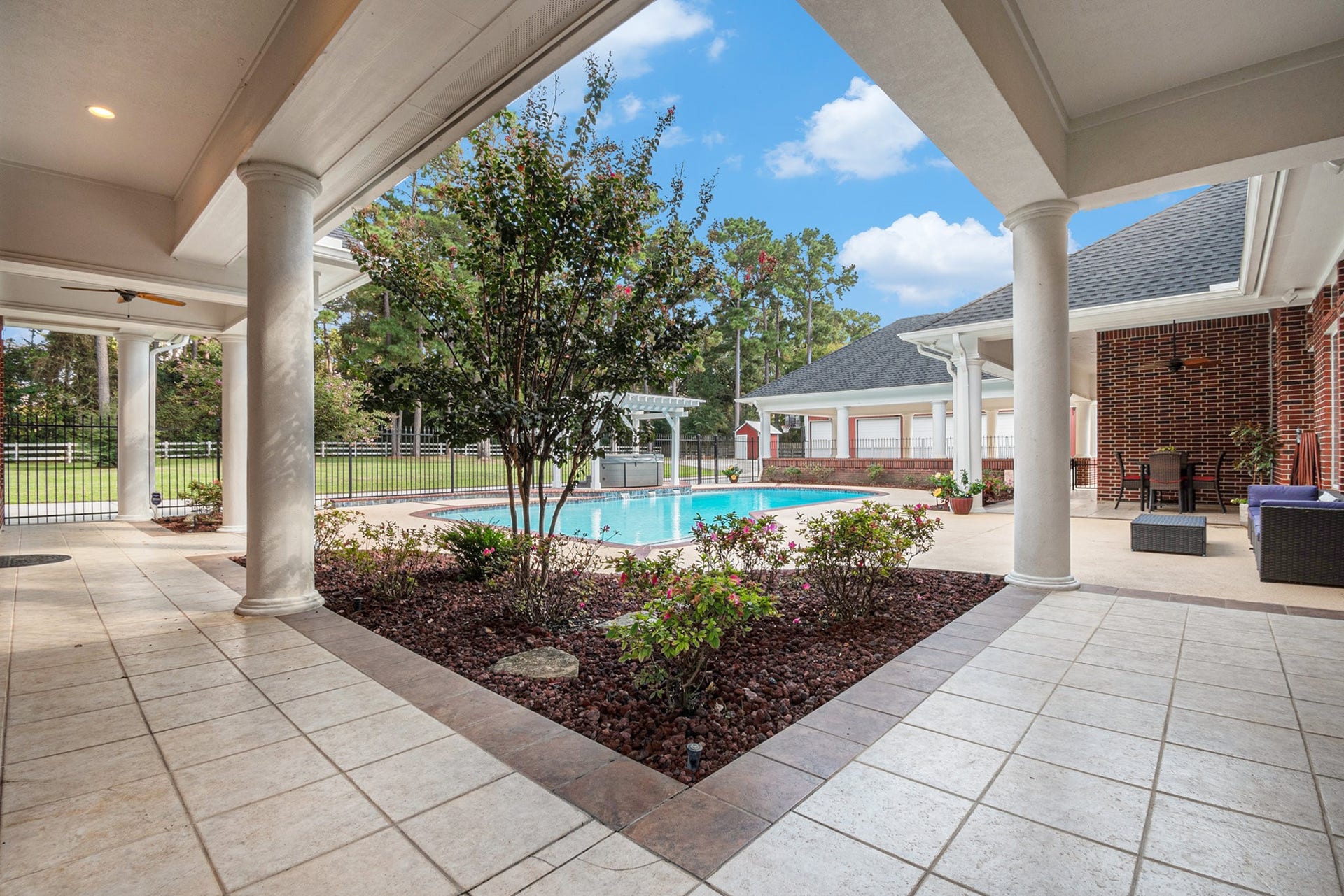 28126 Indigo Lake Court, Magnolia, TX 77355 Another fantastic view of this resort-style backyard.