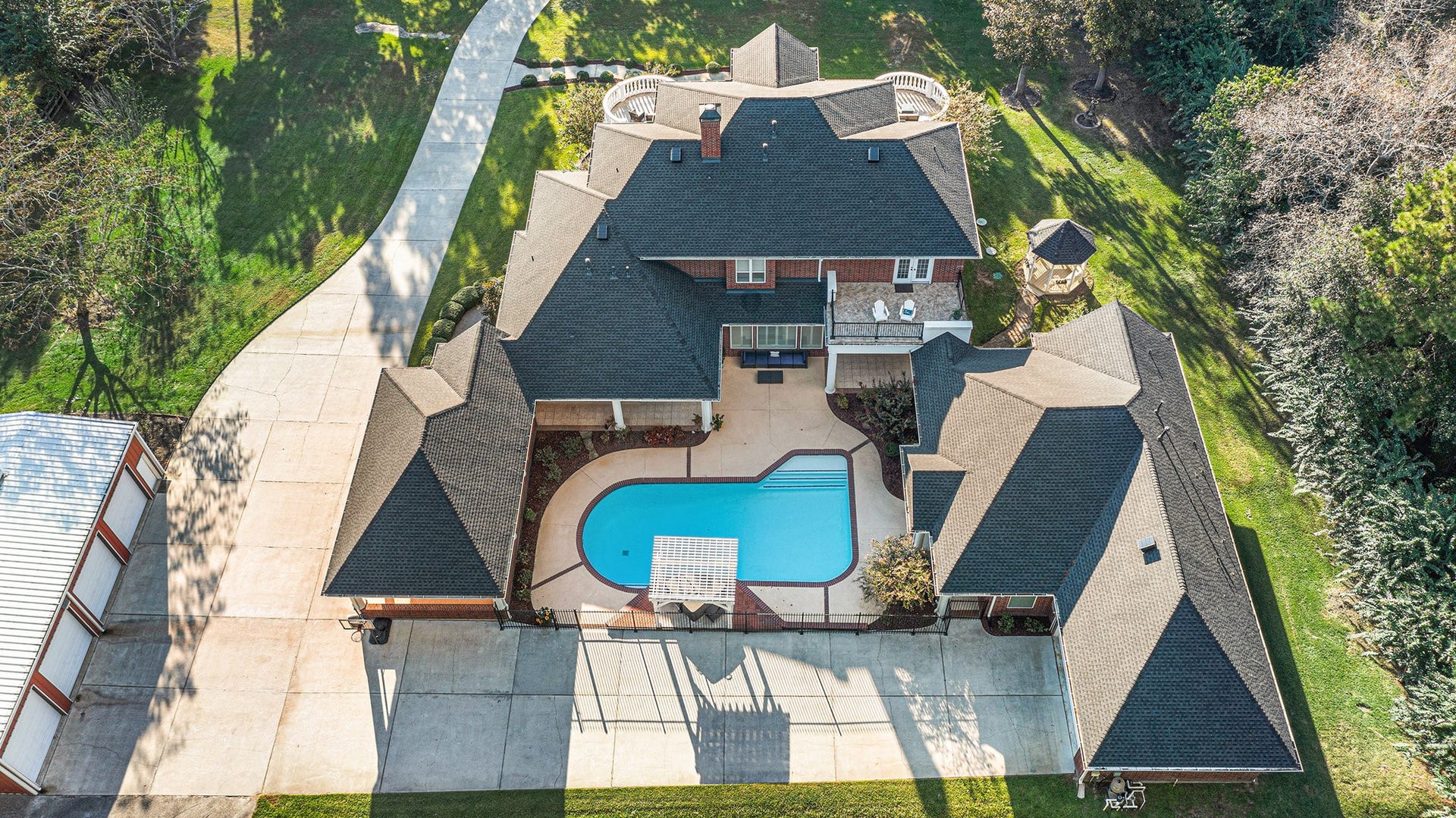 28126 Indigo Lake Court, Magnolia, TX 77355 Full aerial view of the backyard paradise.