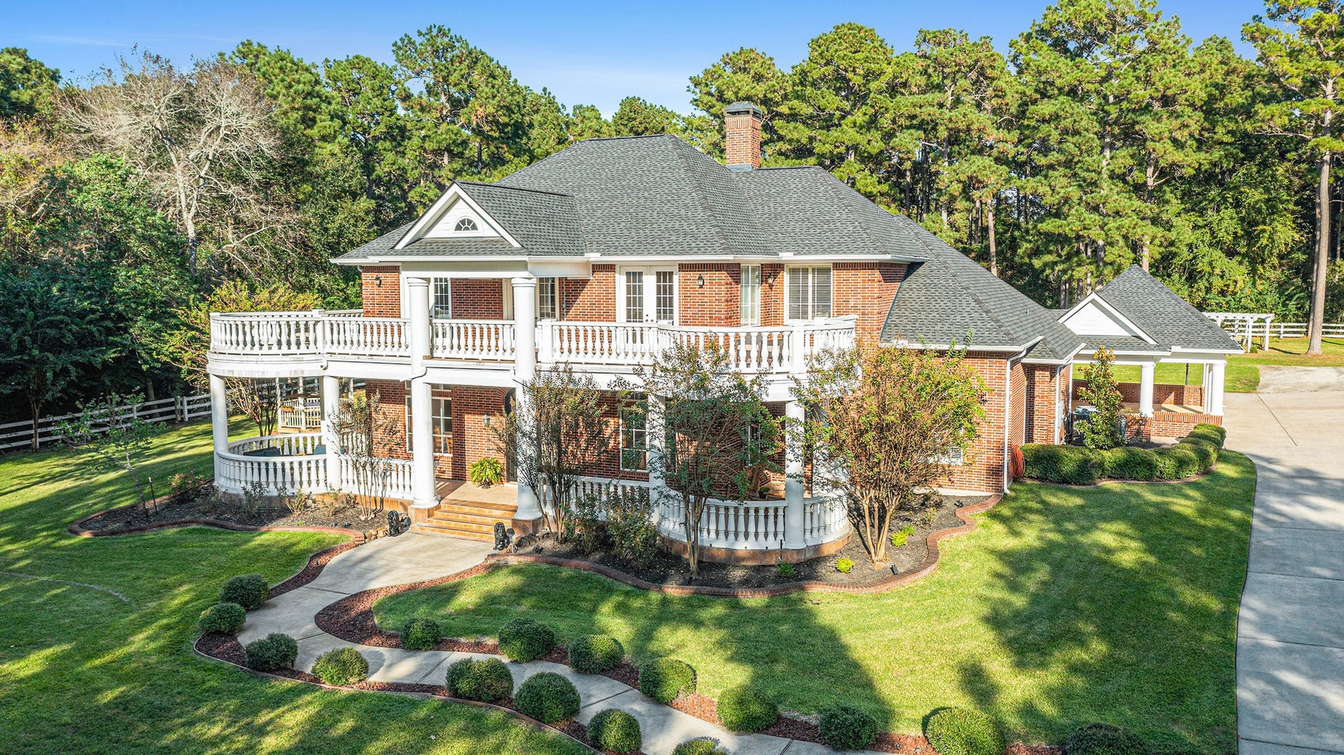 28126 Indigo Lake Court, Magnolia, TX 77355 This magnificent home sits on 2.25-acre featuring 6 beds, 5.5 baths, a guest house, 6-car garage with a 3-car detached carport, a generator, a HUGE workshop and more!