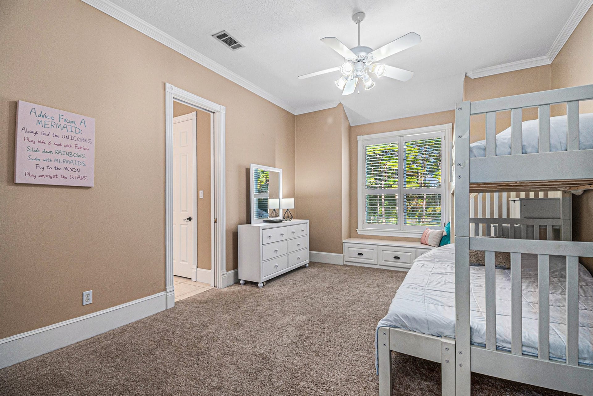 28126 Indigo Lake Court, Magnolia, TX 77355 Adorable upstairs secondary bedroom with a reading bench.