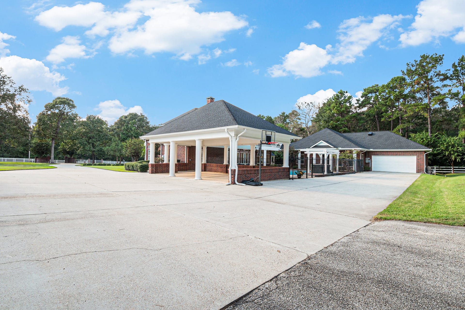 28126 Indigo Lake Court, Magnolia, TX 77355 In addition to the 4-car garage, this remarkable property has a 3 car carport and a another 2 car garage off the guest house.