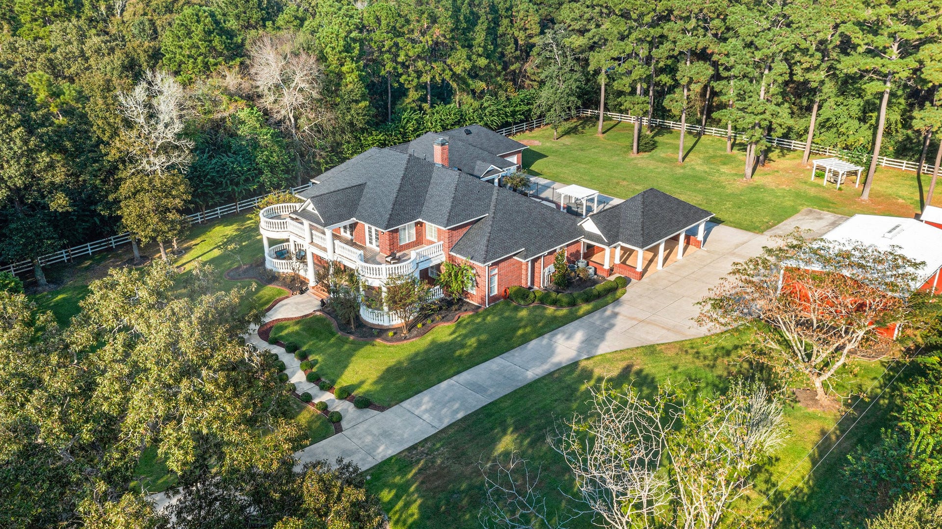 28126 Indigo Lake Court, Magnolia, TX 77355 Tons of beautiful trees surround this remarkable property.
