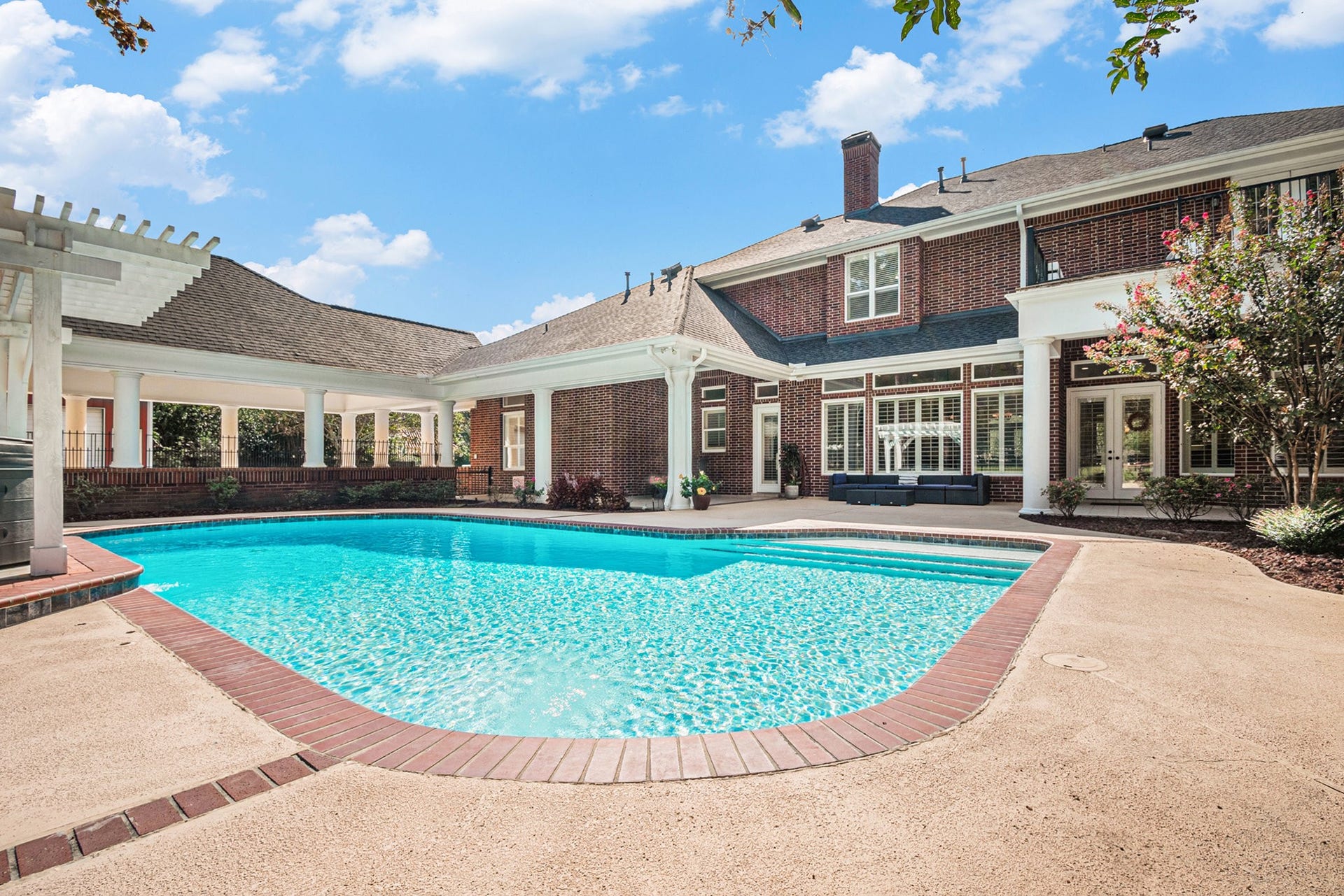 28126 Indigo Lake Court, Magnolia, TX 77355 Remarkable backyard oasis showcases a sparkling pool, a hot tub, and tons of space to entertain!