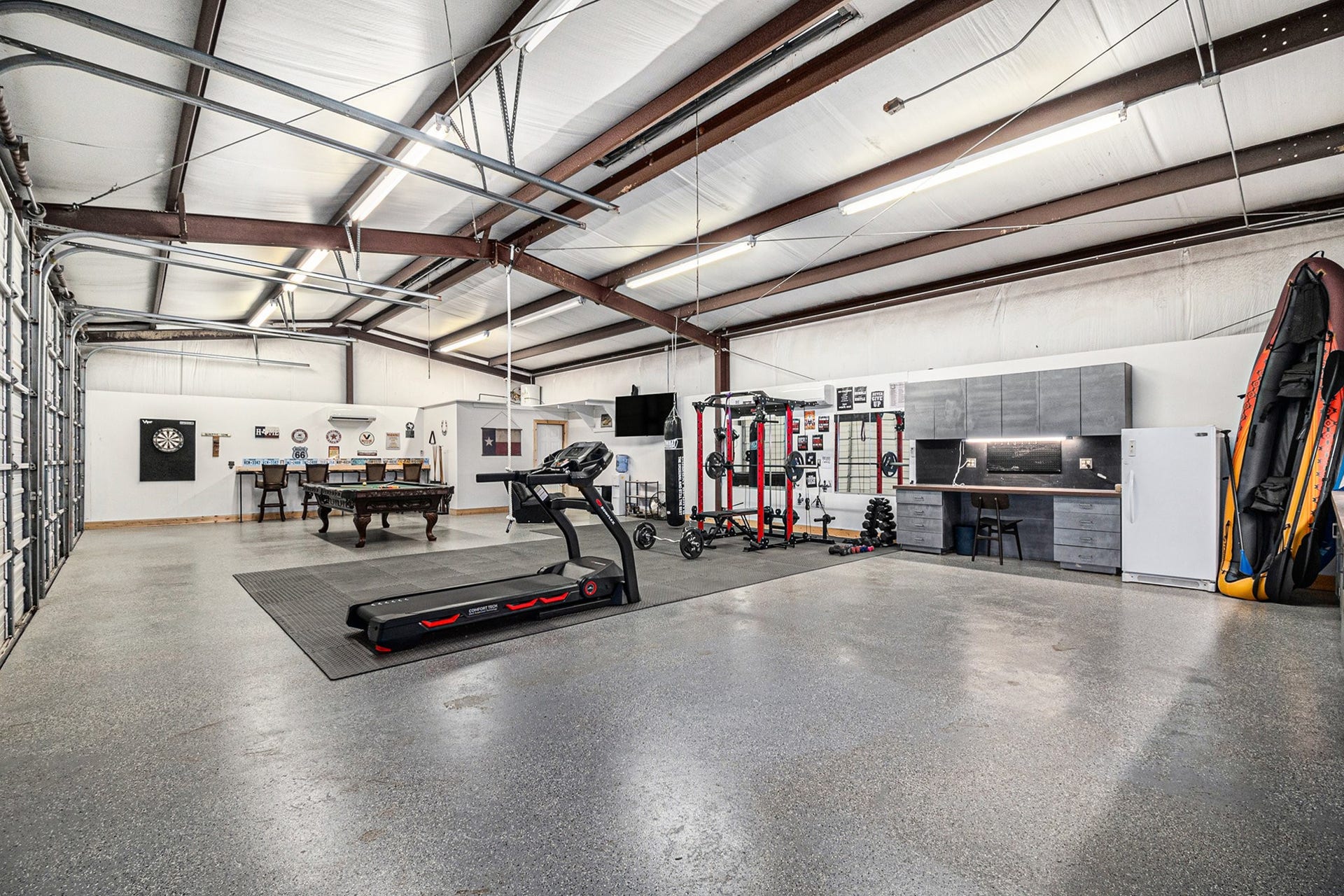 28126 Indigo Lake Court, Magnolia, TX 77355 Spectacular 4-car garage/workshop with a sink and shower.
