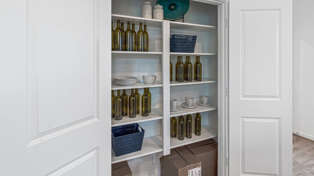 7334 Grand Mason Drive, Cypress, TX 77433 Convenient storage closet is a great benefit.