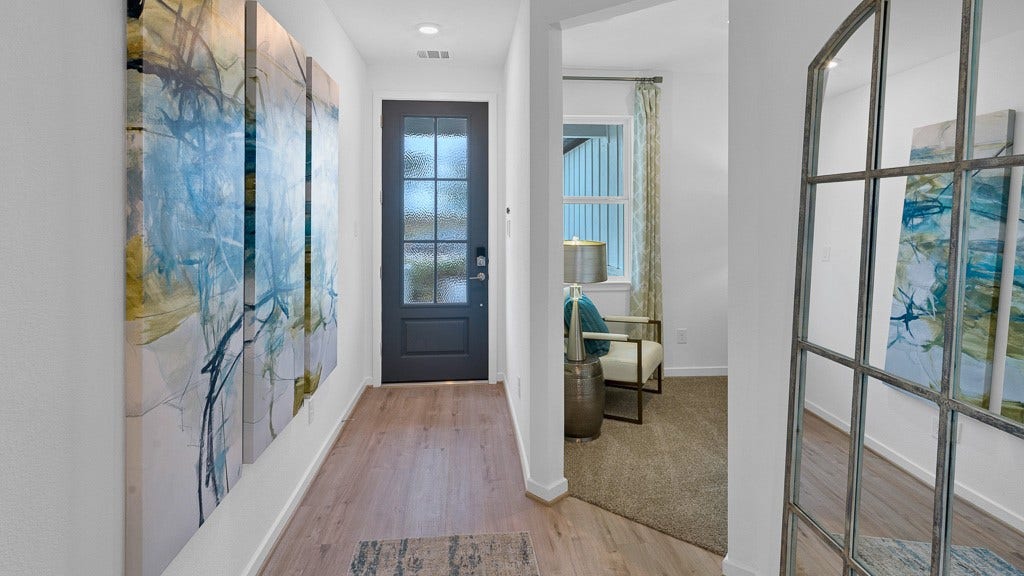 7334 Grand Mason Drive, Cypress, TX 77433 Foyer is light and bright with natural lighting from beautiful 6-lite glass custom front door.