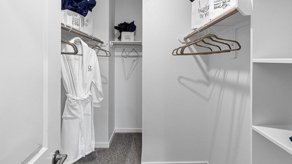 7334 Grand Mason Drive, Cypress, TX 77433 Primary suite has a spacious walk-in closet.