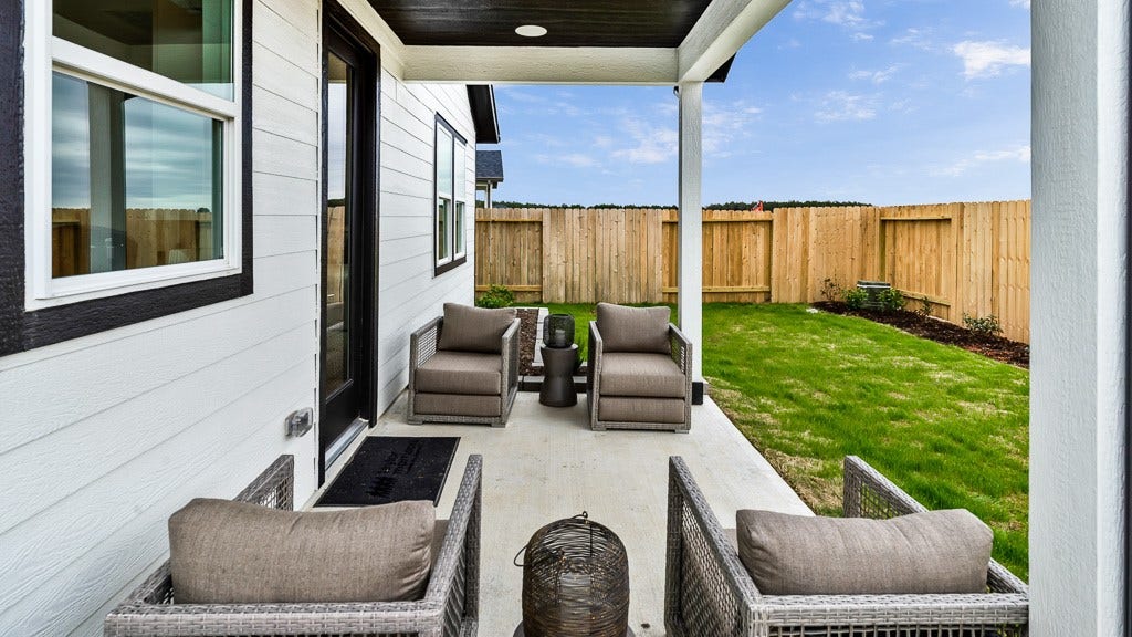 7334 Grand Mason Drive, Cypress, TX 77433 Covered lanai has room for lounge furniture to enjoy outdoor relaxation.
