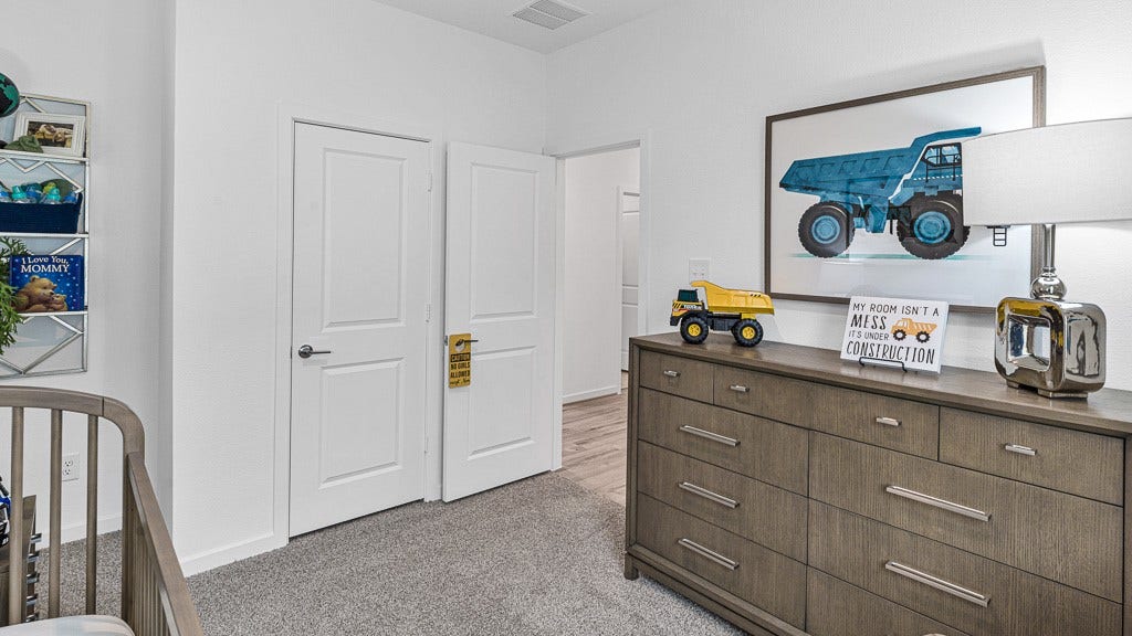 7334 Grand Mason Drive, Cypress, TX 77433 Bedroom 2 has a walk-in closet.