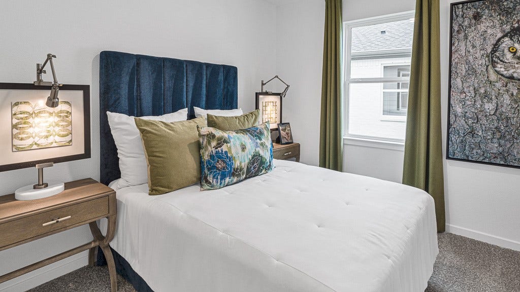 7334 Grand Mason Drive, Cypress, TX 77433 Bedroom 3 has upscale style with a beautiful window and custom drapery.