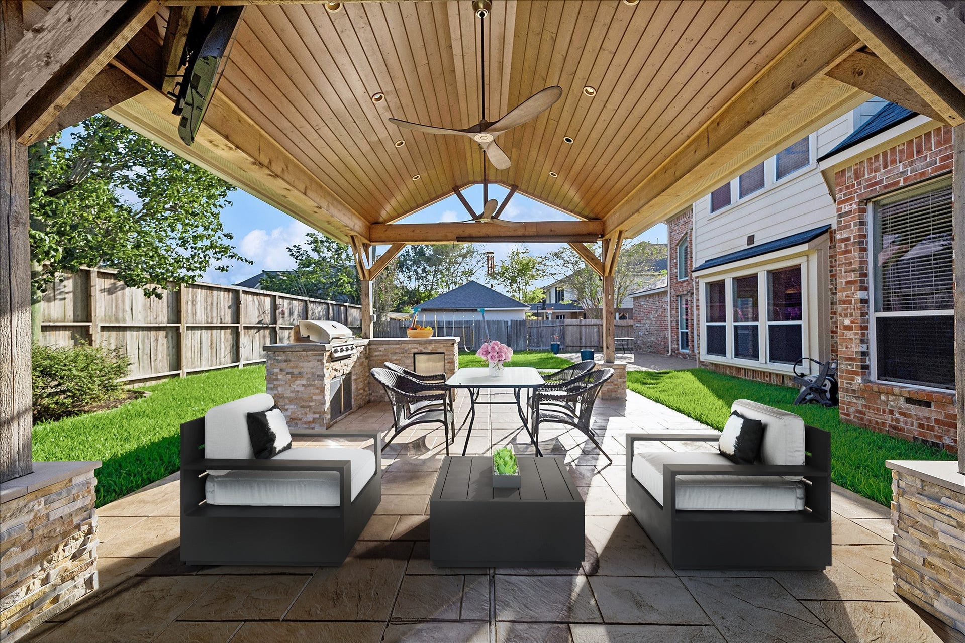 2902 Grand Mesa Pass, Missouri City, TX 77459 This covered patio is made for lingering. Fire up the grill, settle in for the big game or gather around the table with friends while cathedral ceilings, sleek twin fans, recessed lights and a full outdoor kitchen set the stage for effortless entertaining.