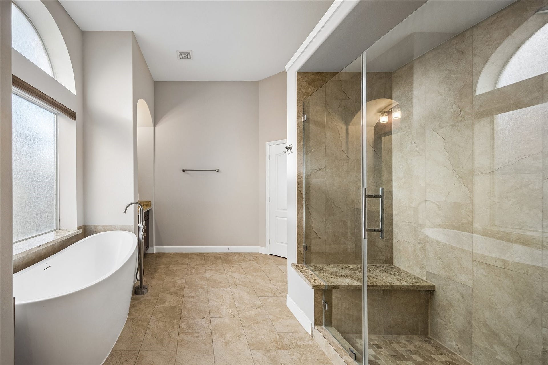 2902 Grand Mesa Pass, Missouri City, TX 77459 Daily routines get the spa treatment here. Start the day refreshed and end it completely unwound with a freestanding tub and updated walk-in shower with frameless glass creating a relaxing retreat you get to enjoy every day.