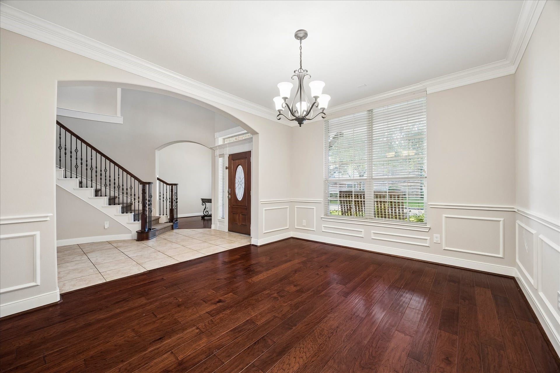 2902 Grand Mesa Pass, Missouri City, TX 77459 Gather them around your table to honor old traditions and create the new. This elegant formal dining room sets the scene with resurfaced wood flooring, rich millwork, thick crown molding, fresh paint, stylish lighting and oversized windows that fill the space with natural light.