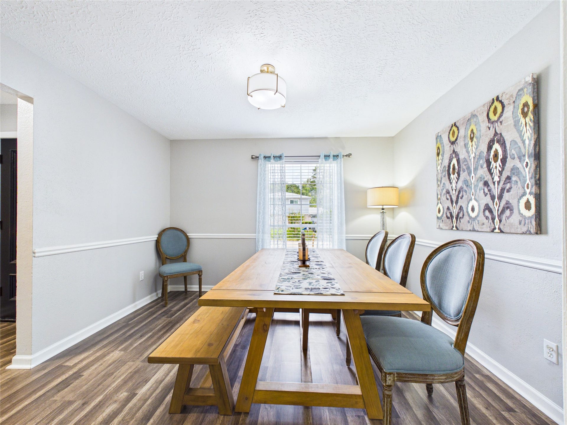 6209 Brookdale Drive, League City, TX 77573 Charming dining area with elegant wood flooring with plenty of light.