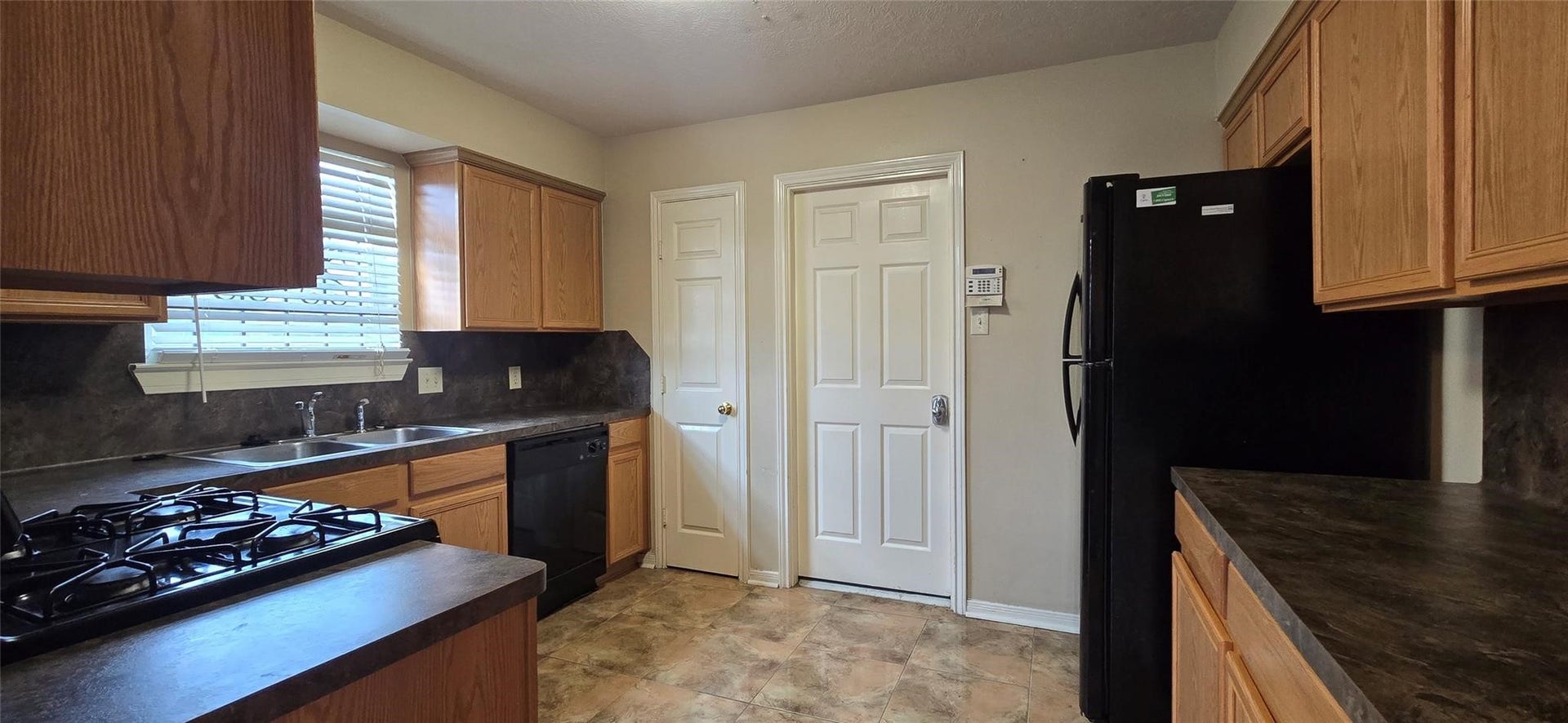 7929 Comal Street, Houston, TX 77051 Refrigerator remains with property.