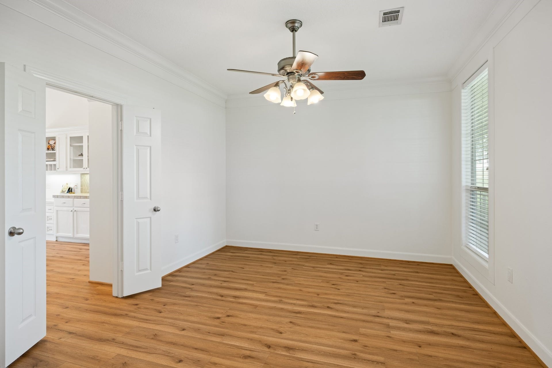 34310 High Point Drive, Magnolia, TX 77355 Elegant dining room next to the kitchenideal for hosting dinner parties.