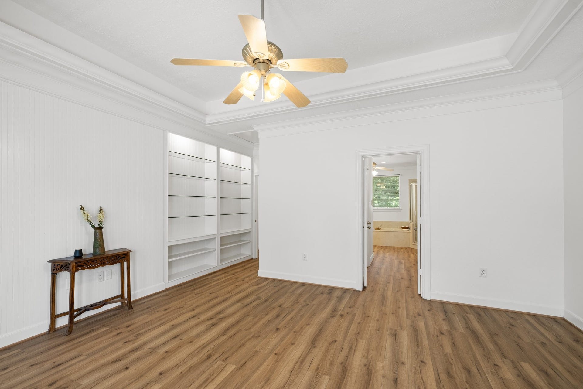 34310 High Point Drive, Magnolia, TX 77355 Explore the elegant built-in shelves in the primary bedroom, perfect for showcasing your art and cherished photos.