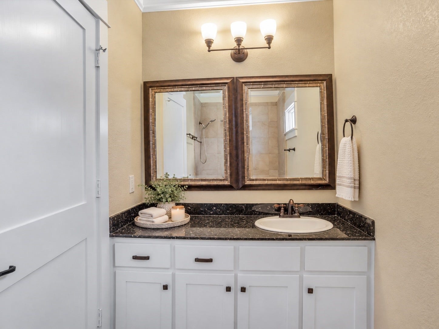 837 E 27th Street, Houston, TX 77009 Secondary en-suite bathroom. This photo has been virtually staged using AI.