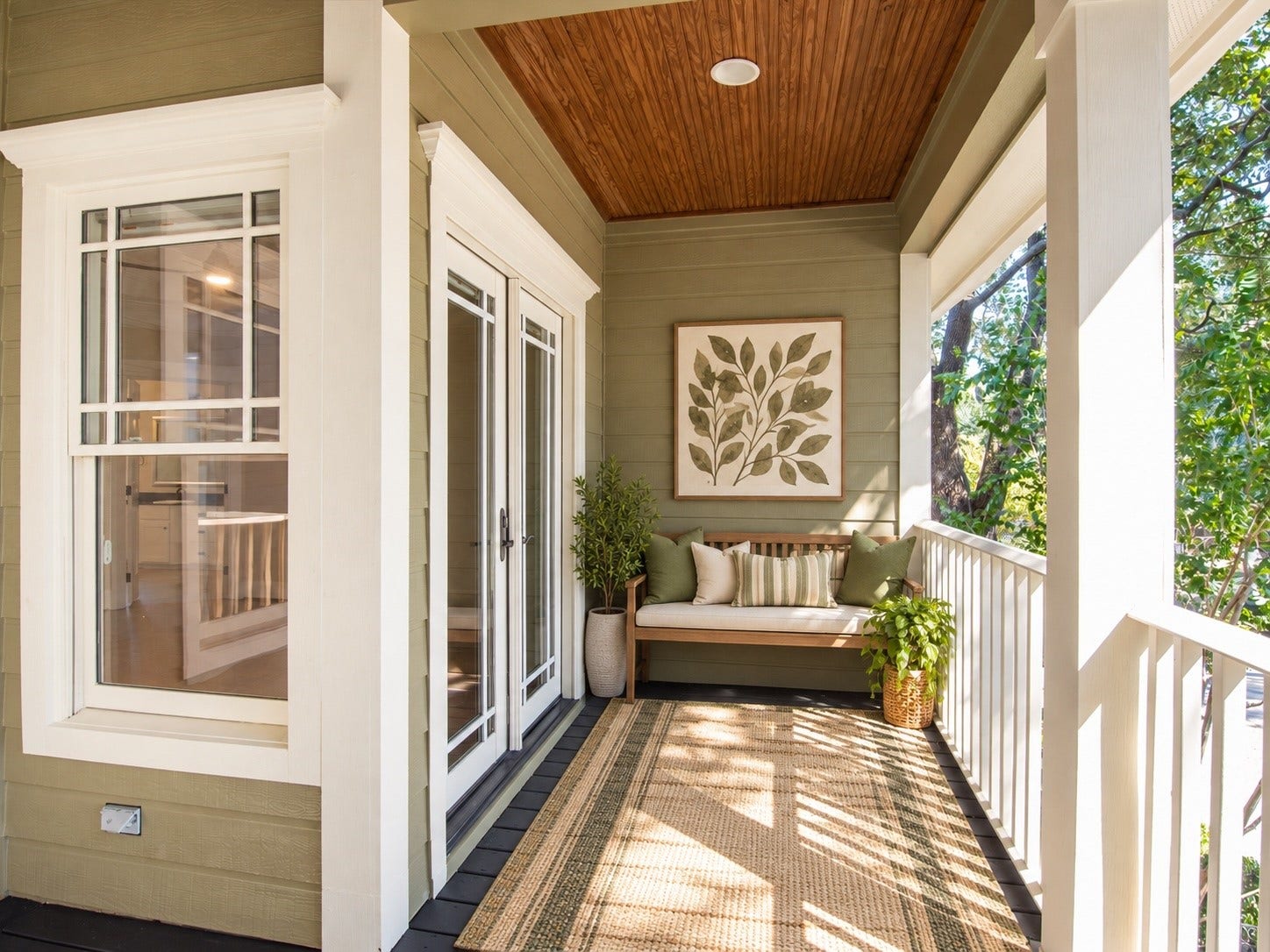837 E 27th Street, Houston, TX 77009 The private upstairs balcony accessible through the primary suite. This photo has been virtually staged using AI.