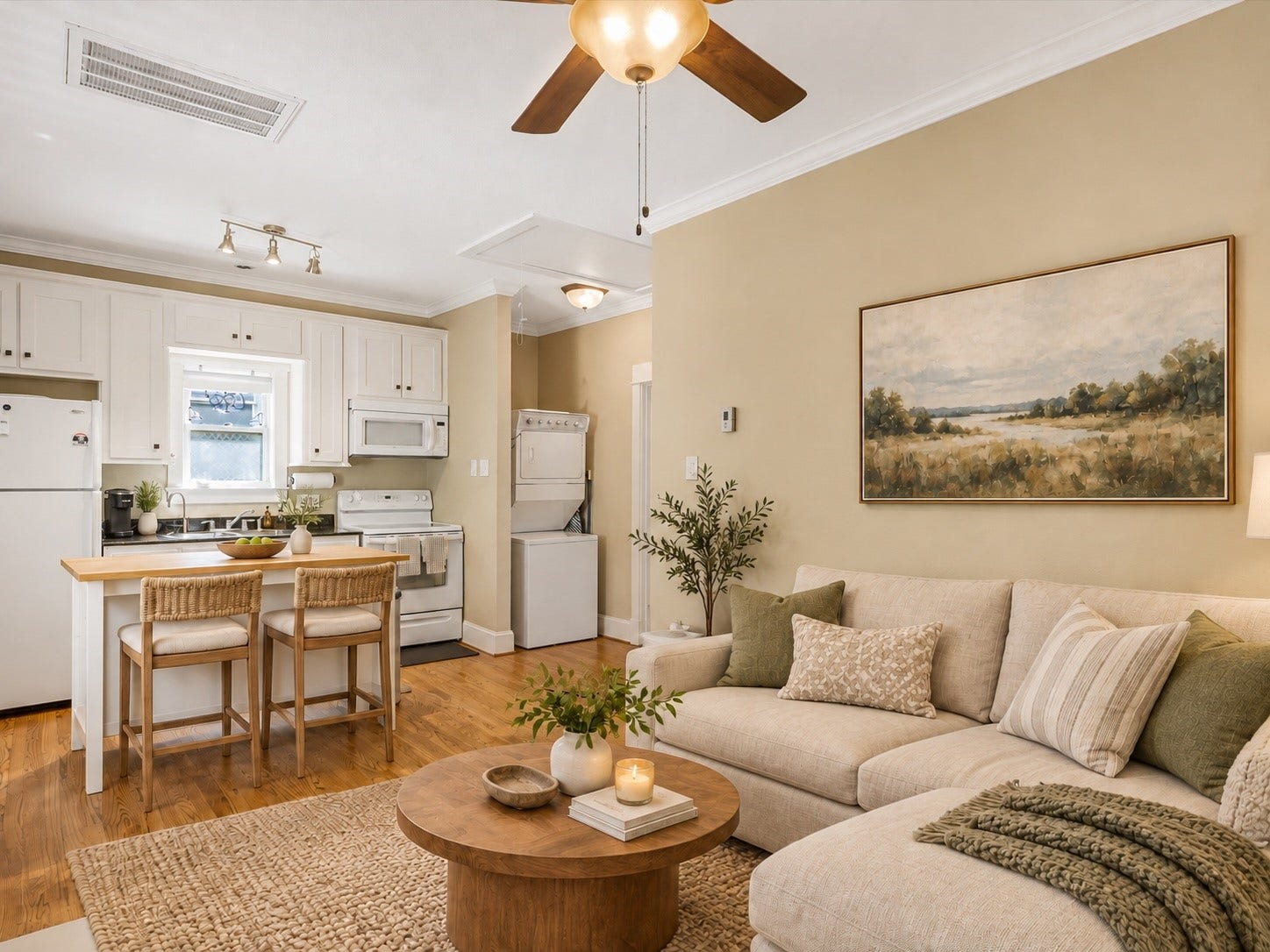 837 E 27th Street, Houston, TX 77009 Cozy, modern living in this virtually staged garage apartment, featuring a stylish kitchen and convenient washer/dryer hookups.