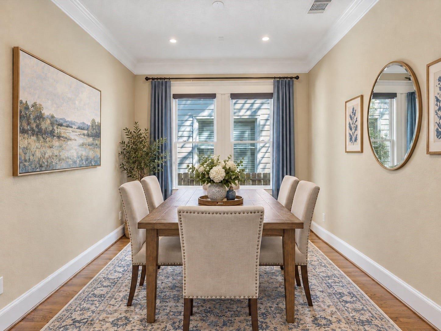 837 E 27th Street, Houston, TX 77009 Elegant and inviting dining area, virtually staged with AI, perfect for intimate gatherings around the dinner table.