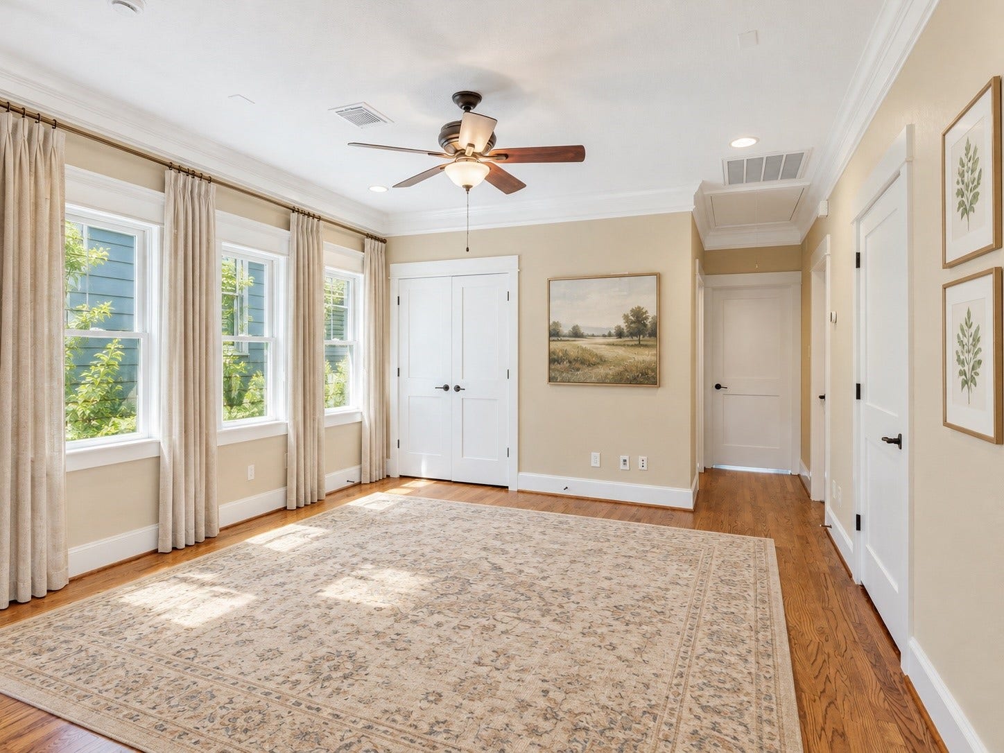 837 E 27th Street, Houston, TX 77009 The upstairs landing offers abundant natural light from large windows. This photo has been virtually staged using AI.