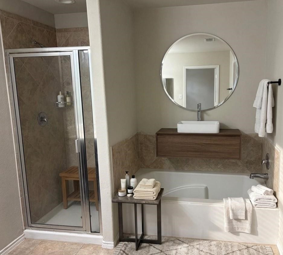 Elegant primary bath featuring modern virtual staging for inspiration.