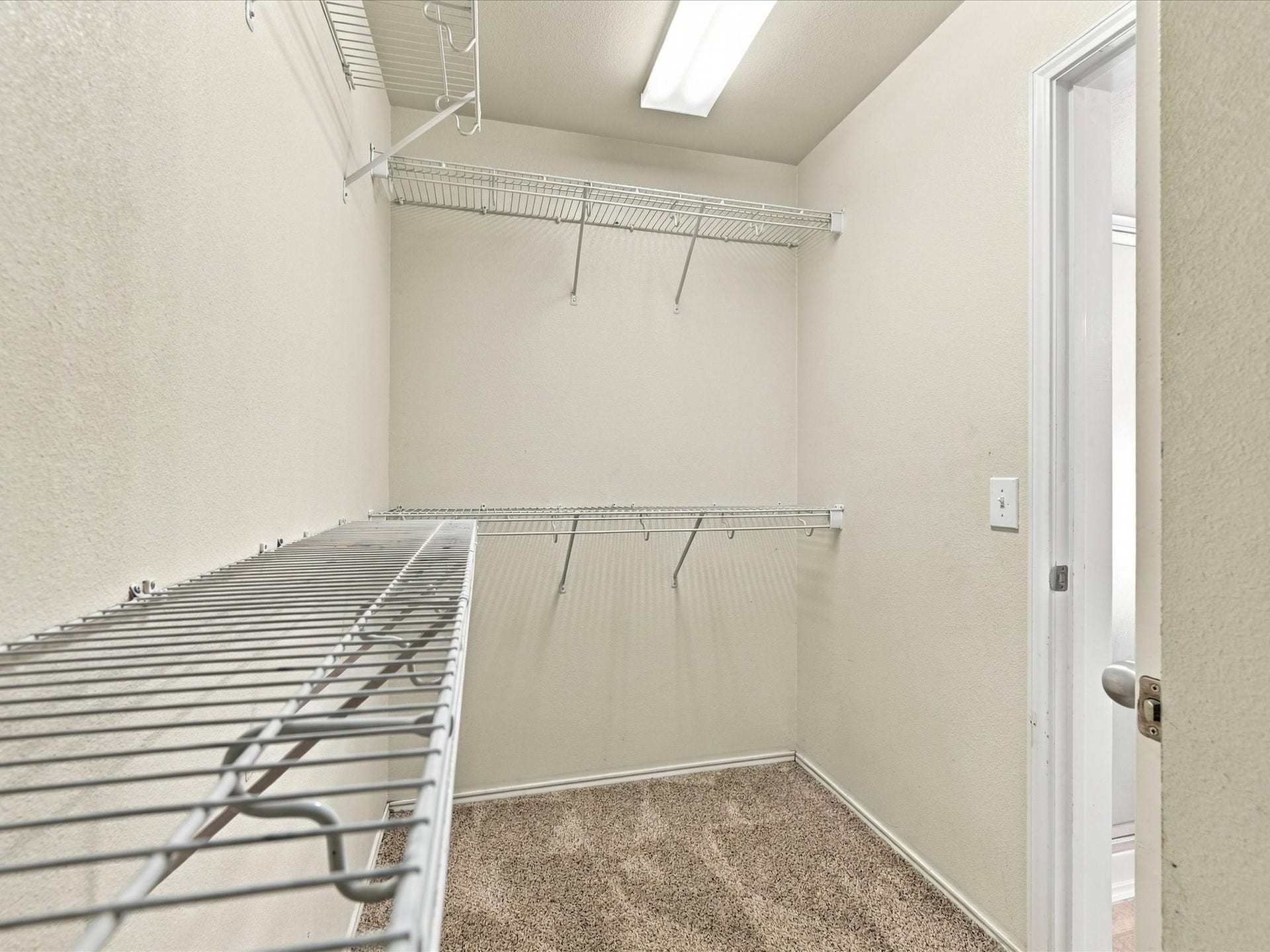 30026 Luna Lakes Drive, Spring, TX 77386 A spacious walk-in closet provides convenient storage and room to keep your wardrobe organized.
